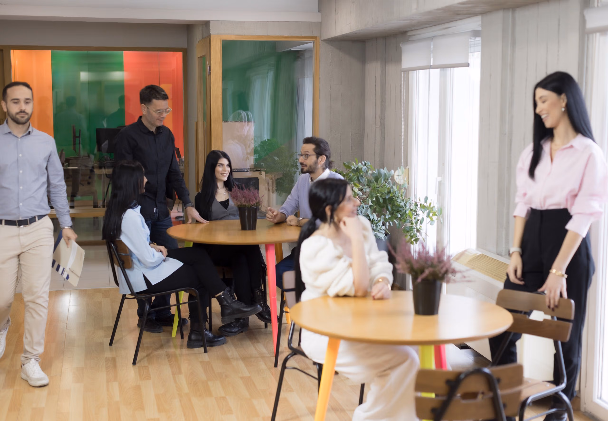This image shows some of our team members talking to each other and having a good time